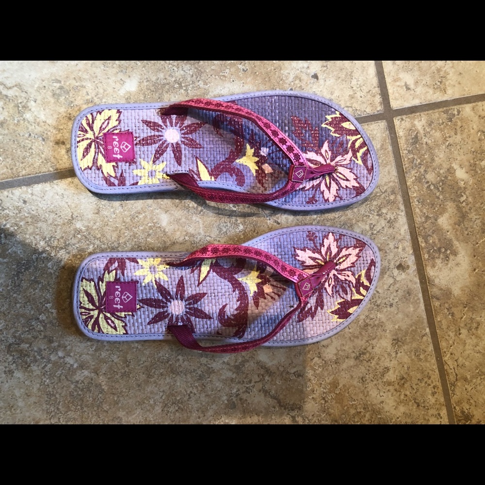 Purple Reef sandals with floral print